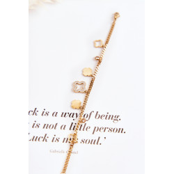 Madinga apyrankė su aukso papuošalais