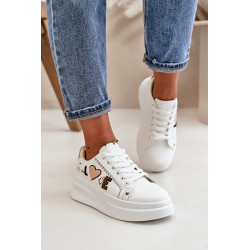 Moteriški sportbačiai ant platformos su dekoratyviniu raštu White Orlian 199883